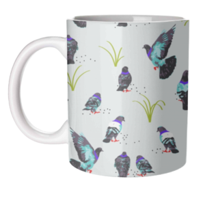 White mug with repeated pigeon pattern