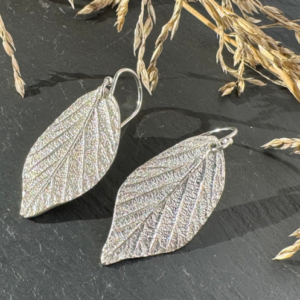 silver bramble leaf shaped dangly earrings